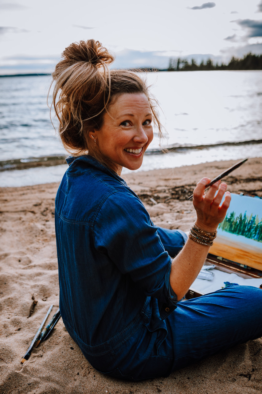 Melissa Jean painting on a Beach