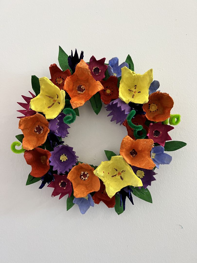 floral wreath crafted from egg cartons