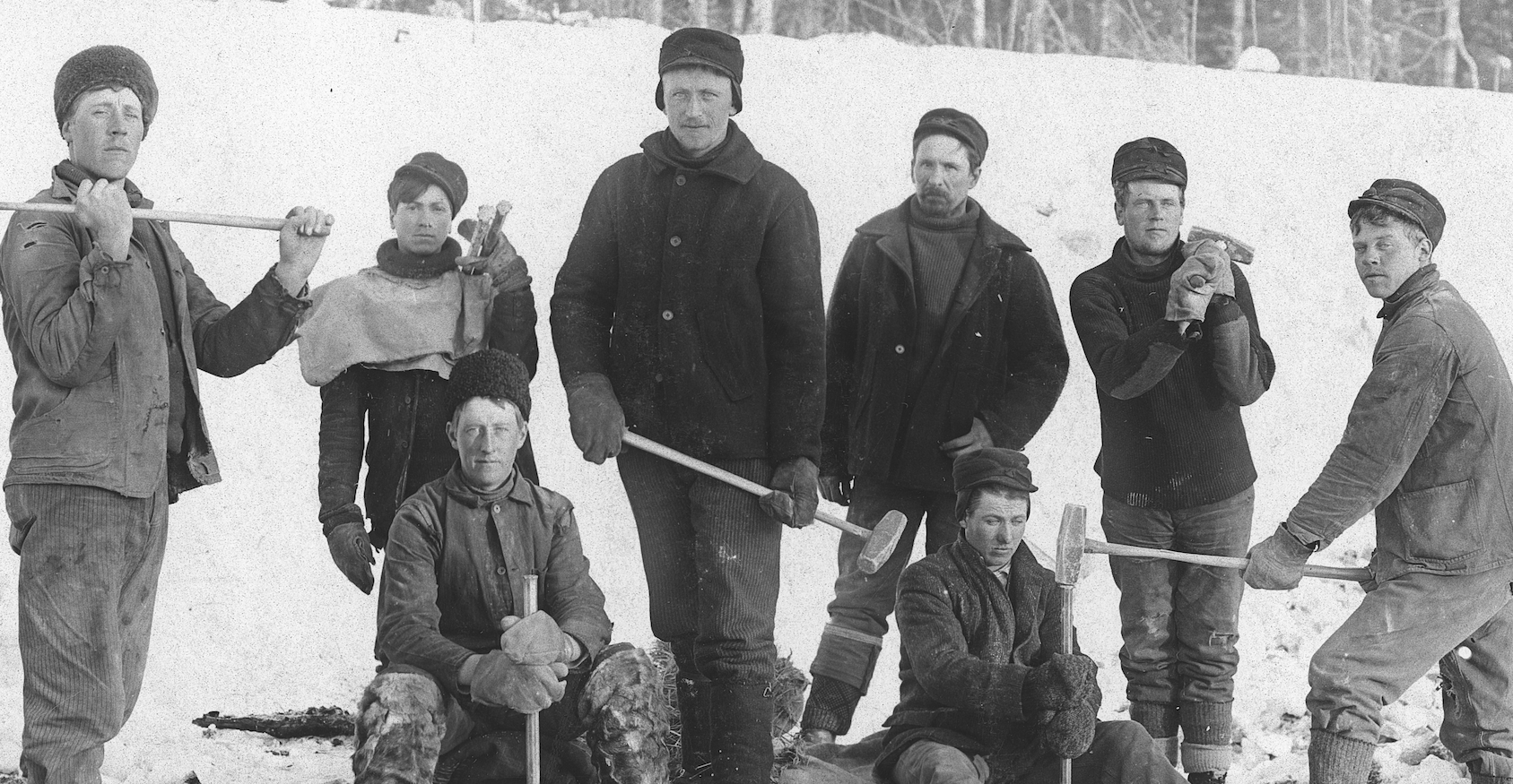 Young Ukrainian men on a drilling gang pose during the building of the Transcontinental Railway in northwestern Ontario in 1908. Photographer: C.G. Linde